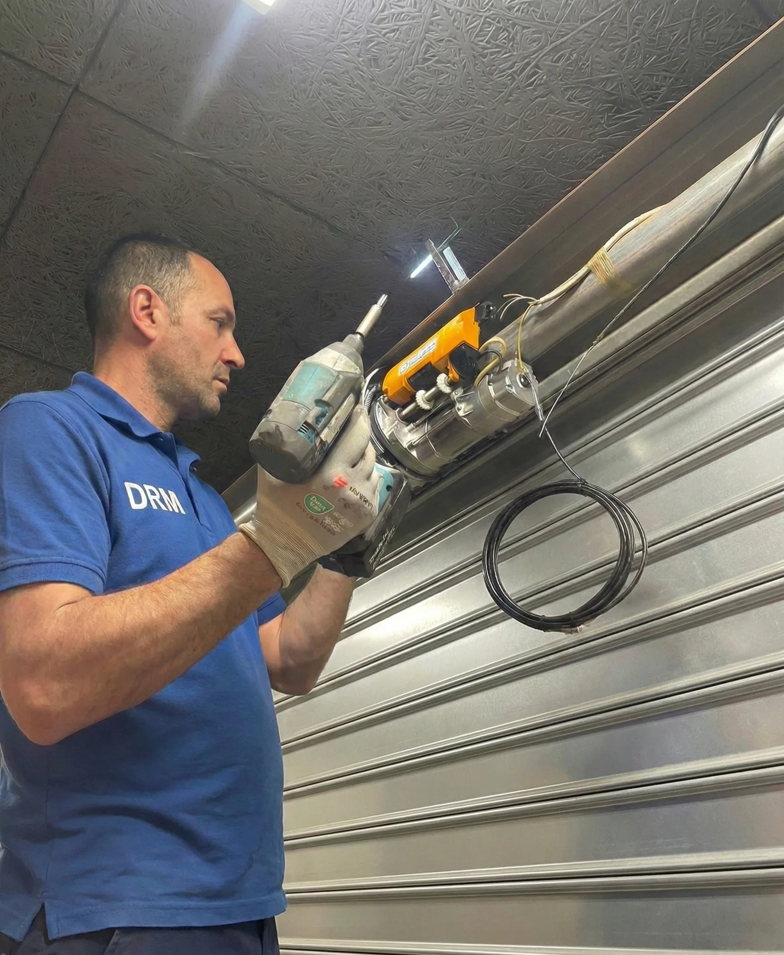 Motorisation rideau metallique sur-mesure Vernon